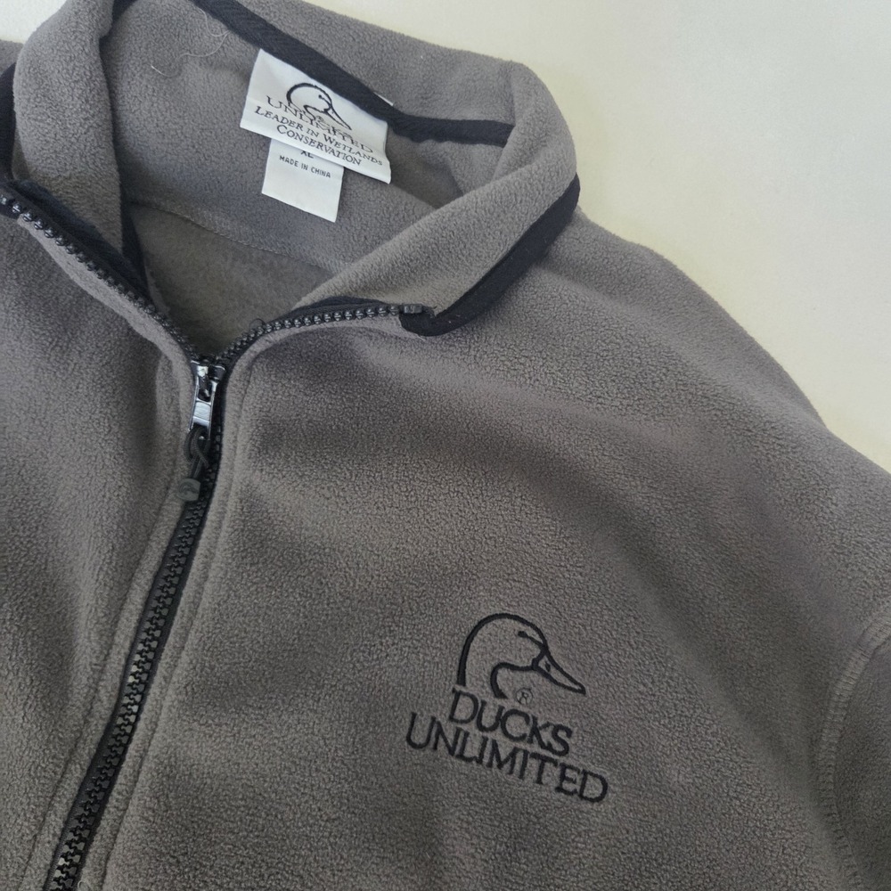 Ducks Unlimited Fleece Grey in color with duck logo on left chest side size XL